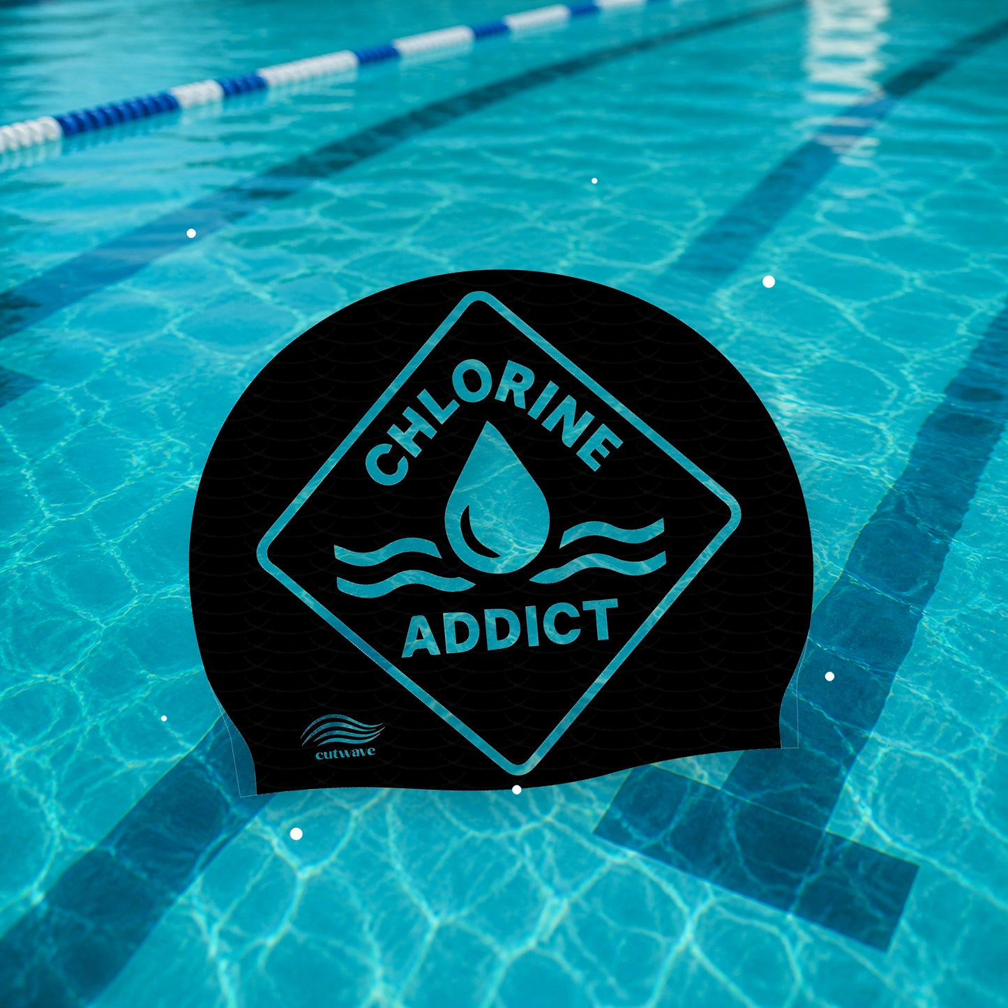 Chlorine Addict Water Drop silicone swim cap on pool water