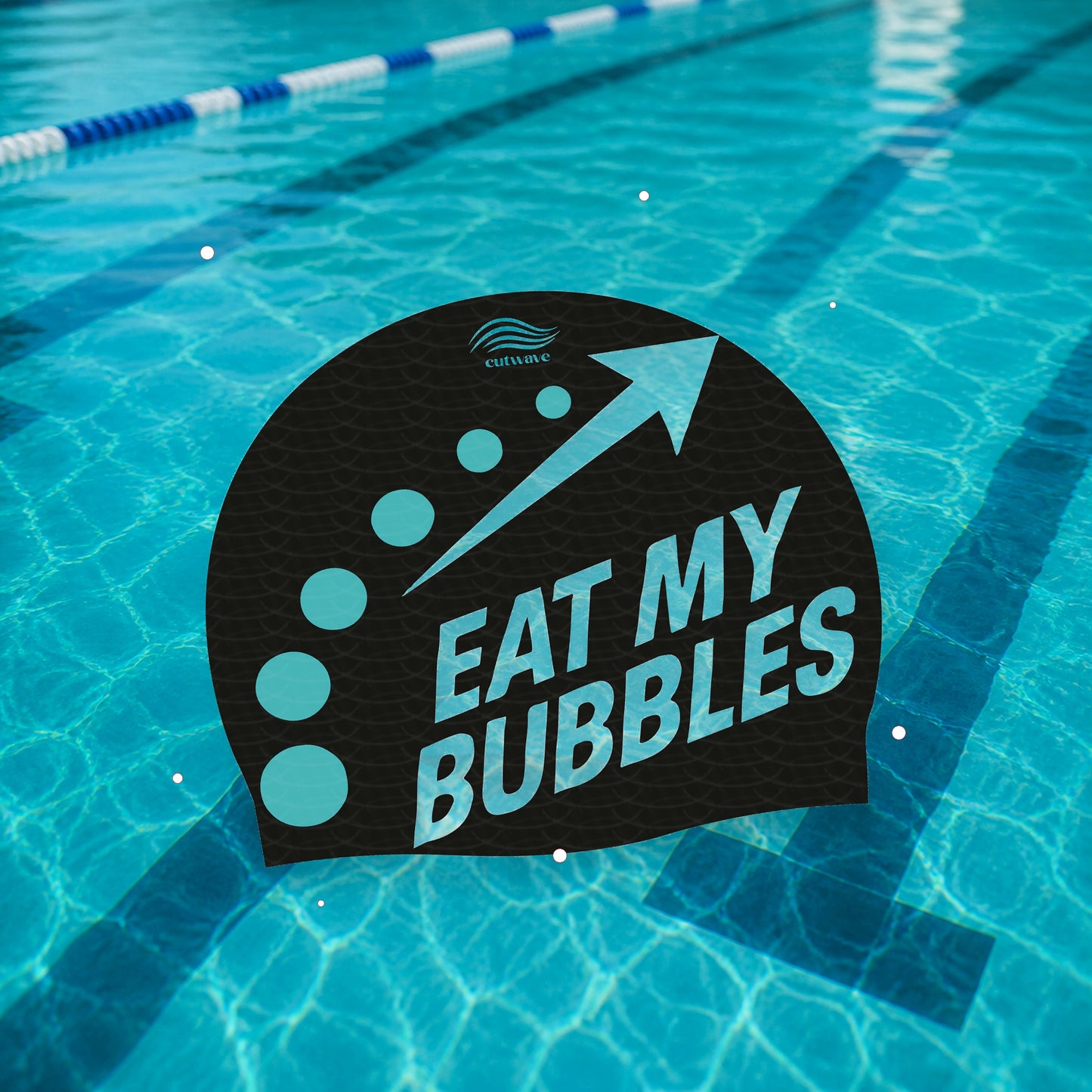 Eat My Bubbles silicone swim cap on pool water